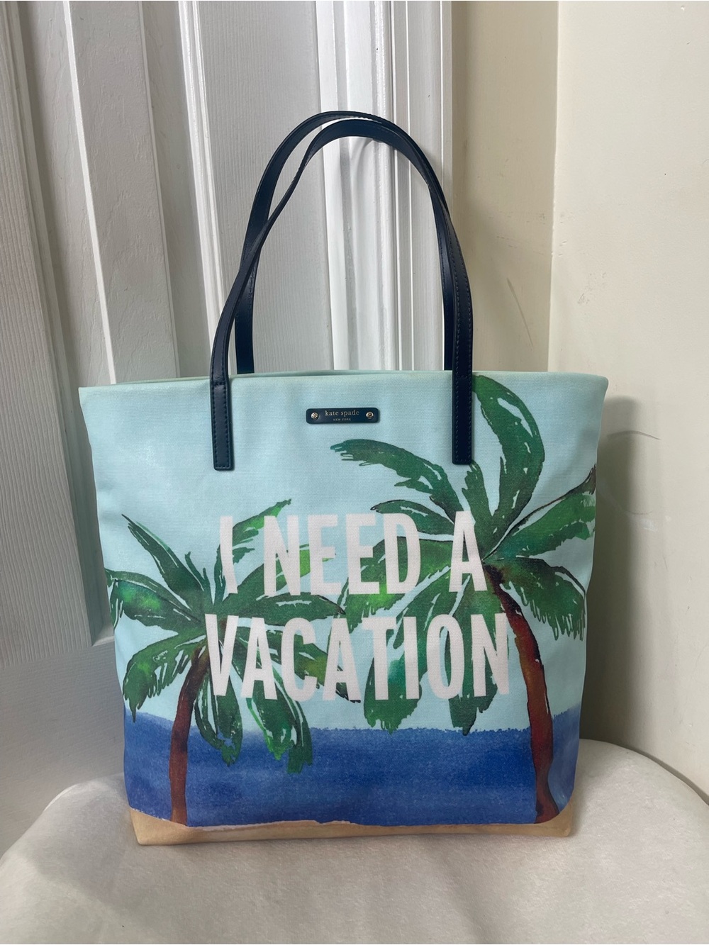 kate spade "I Need a Vacation" pastel blue palm-print canvas tote